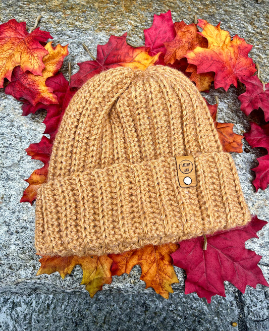 Handmade crochet winter hat in citrine yarn with a detachable faux fur pom-pom, cozy and stylish for cold weather