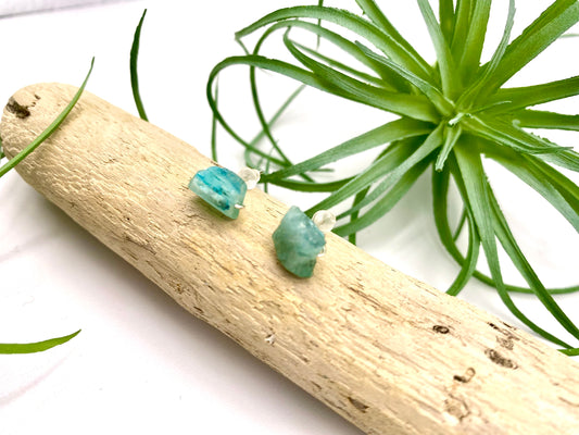 Pair of blue apatite gemstone stud earrings set in sterling silver, showcasing a minimalist and elegant design